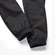 Ankle Closeup Of Black Fleece Sweatpants by Pants for Peanuts