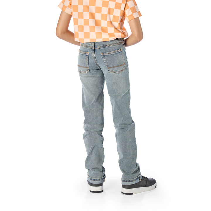 Back of Tall Slim Boy Wearing Slim-Fit Light Wash Jeans / Pants for Peanuts